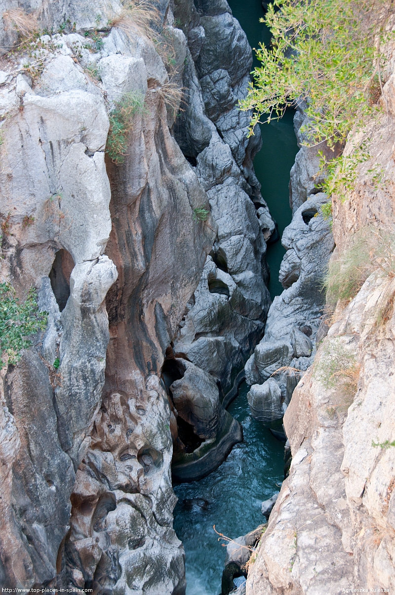 The Guadalhorce river deep down in the El Chorro canyon